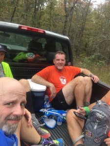 Hitching a ride back to our cars after the run